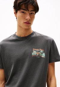 Tommy Jeans UNISEX czarny