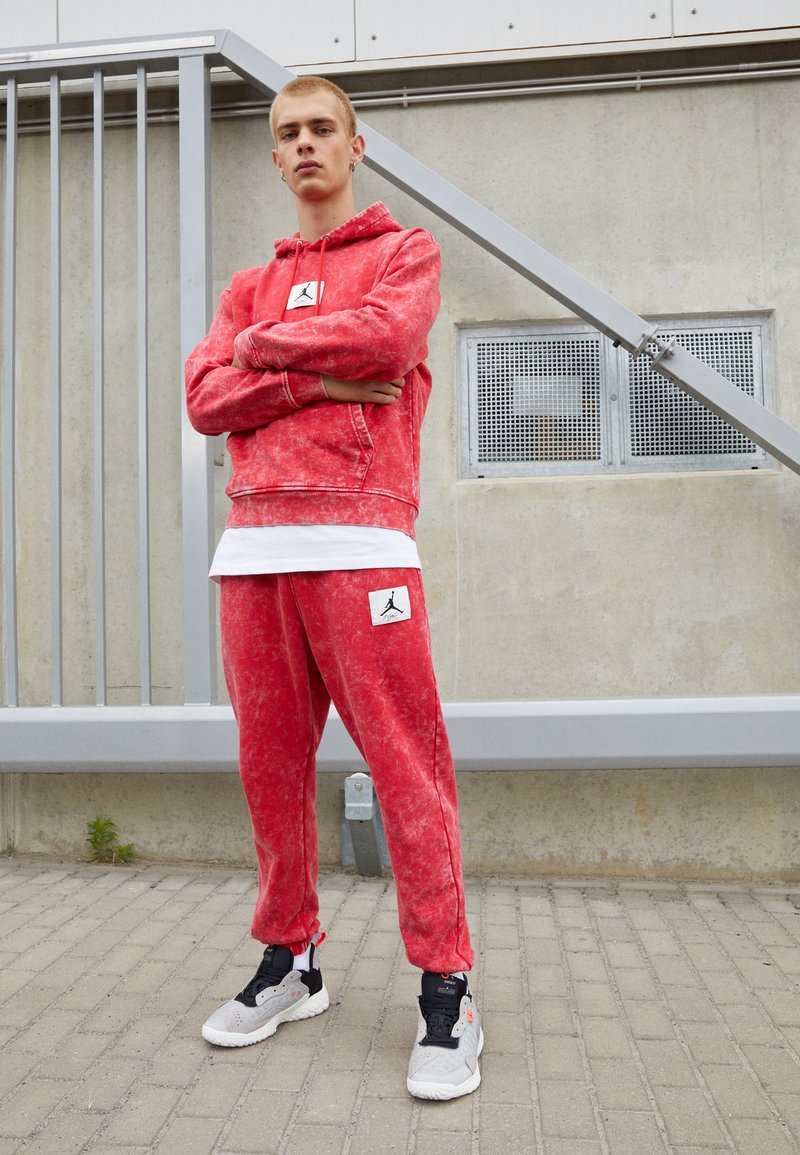 Jordan Tracksuit bottoms fire red/red Zalando.co.uk