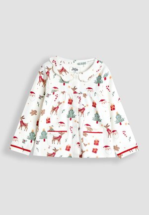 Biała dziecięca koszula z długim rękawem na guziki z nadrukiem świątecznym przedstawiającym renifery, Świętego Mikołaja, cukrowe laski, choinki, prezenty oraz pierniczki.