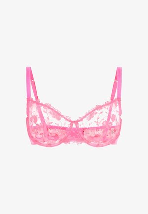 Soutien-gorge en dentelle rose avec broderie florale, coupelles transparentes, bretelles réglables et bordure festonnée. Il est doté d'une fermeture à crochets et œillets au dos.