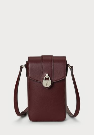 Burgundy leather crossbody bag with a structured shape, top flap, silver latch, and adjustable strap. Smooth texture with minimal accents.