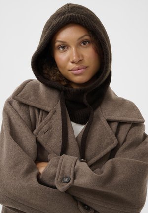 Brown wool blend coat with a large hood, featuring a contrasting dark brown inner knit. Double-breasted with large buttons and wide lapels.