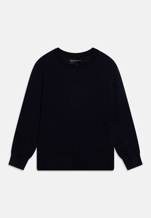 Tumedat sinise värvi kootud sviiter pikade varrukatega, ümar kaelus ja tekstuurne muster. Lõpetatud soonikkoes ääriste ja varrukatega. Vastupidav kangas.