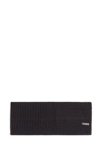 Bandeau en tricot noir with a texture côtelée, design uni, et une petite étiquette logo cousue sur le côté. Mesure environ 61 centimètres de large.