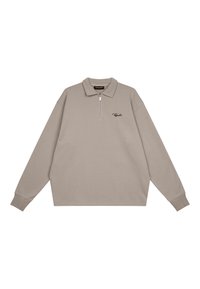 Beige langærmet polo skjorte med lynlås krave, prydet med et sort logo på venstre bryst, fremstillet af blødt bomuldsmateriale.
