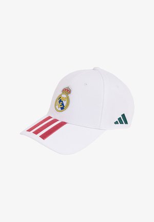Casquette de baseball blanche avec des rayures rouges sur la visière, écusson du Real Madrid à l'avant et logo Adidas vert sur le côté.