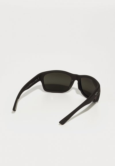 Black sunglasses with dark lenses, rectangular shape, matte finish, and straight arms. Features a subtle engraving on the side.