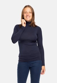 Maglia a collo alto navy a maniche lunghe, dal design aderente, realizzata in tessuto morbido, con un aspetto senza cuciture e collo alto.