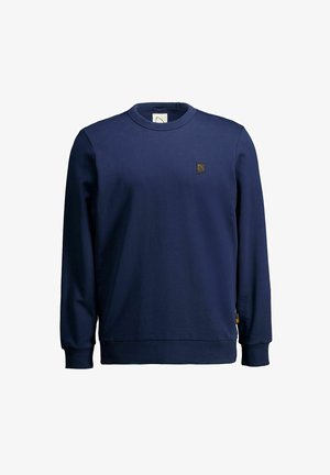 Námořnická modrá mikina vyrobená z jemné tkaniny, s kulatým výstřihem, ribovanými manžetami a lemem, a s malou hnědou logem nášivkou na hrudi.