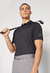 adidas Golf TOUR STRIPE - Polo shirt - black