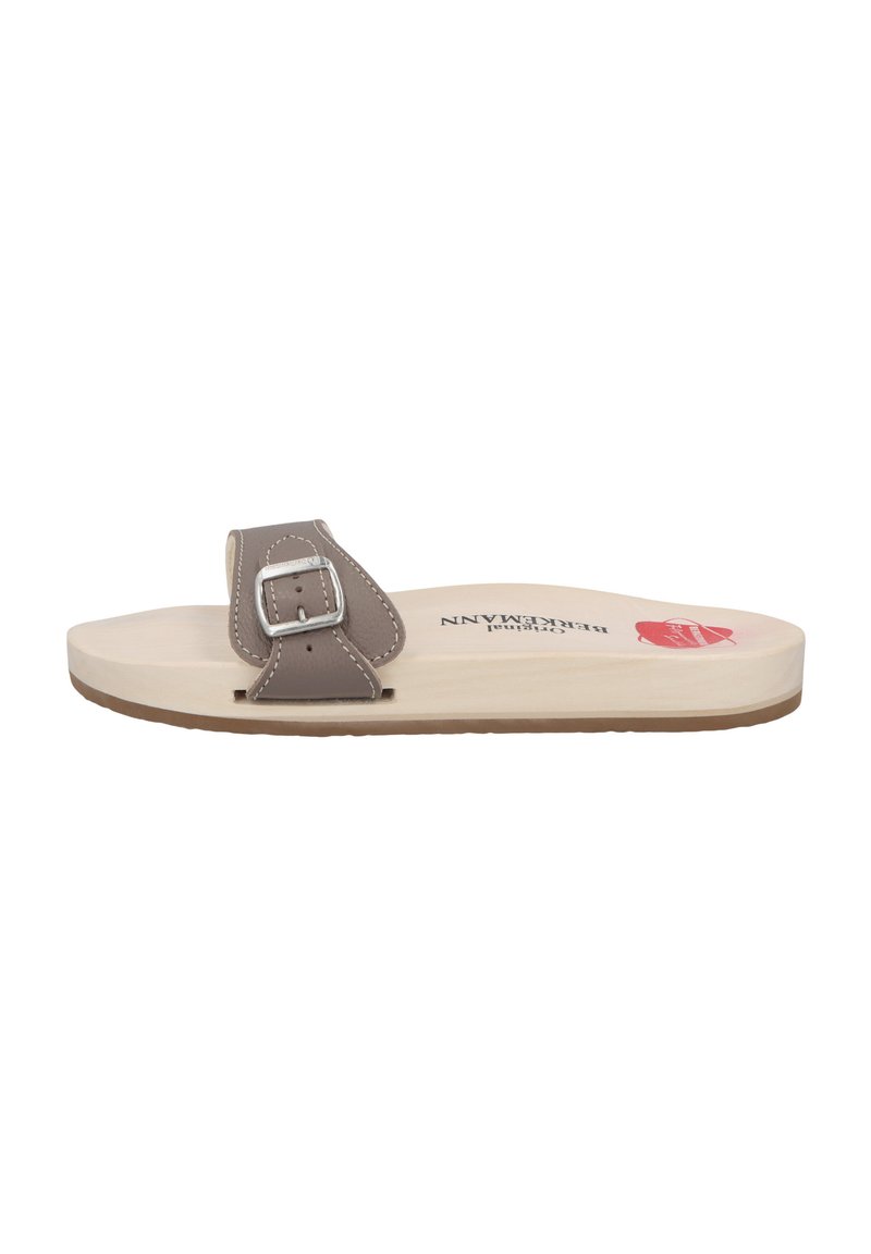 Gray leather slide sandal with a single strap, silver buckle, beige footbed, and light brown sole. Minimalist design with stitching detail.