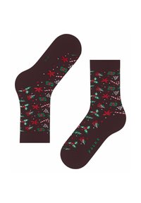 Braune Socken mit einem festlichen Muster aus roten Sternen, grünem Efeu und weißen Zuckerstangen. Das Material besteht wahrscheinlich aus einem weichen, dehnbaren Stoff.