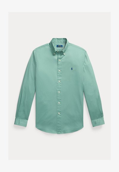 Chemise vert mousse marine à manches longues avec col boutonné et petit logo Polo Ralph Lauren brodé bleu marine sur la poitrine.