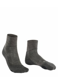 Graue Knöchelsocken mit gerippten Bündchen, strukturiertem Strick und verstärkten Fersen- und Zehenbereichen. Das Material wirkt weich und bequem.