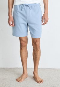 Lichtblauwe katoenen shorts met elastische tailleband en trekkoord, met een gestructureerd oppervlak en een casual, recht gesneden ontwerp.