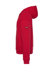 Sudadera con capucha roja hecha de tela suave, con un bolsillo tipo canguro, mangas largas y capucha con cordón. Parche con logo en la manga.