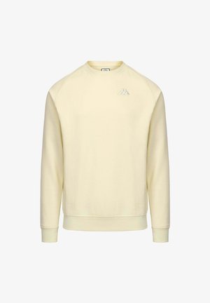 Felpa a girocollo gialla chiara con polsini e orlo a coste, caratterizzata da un piccolo logo bianco sul lato sinistro del petto. Tessuto morbido, design minimale.