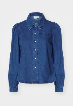 Denim-särg koos struktuurse krae, pikkade puffvarrukate ja nupuvajutusega esiosaga. Tume sinine kangas, millel on õrn tekstuur ja hästi istuv vöökoht.