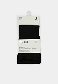 Zwarte katoen capri leggings verpakt met een wit etiket, met maatdetails en het merk "Esprit" in zwarte tekst.
