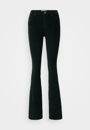 Flared corduroy pants in dark green. Features a high waist, five-pocket design, front button closure, and vertical rib texture.