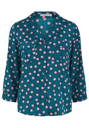 Błękitna bluzka z długimi rękawami w różowe kropki, zapinana na guziki z przodu, z kieszeniami na piersi i kołnierzykiem.
