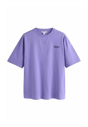Purple cotton t-shirt with a relaxed fit, round neck, short sleeves, and a small black "1980" print on the left chest.