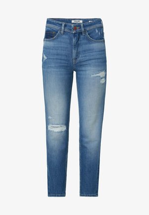 Jean en denim bleu clair à coupe slim. Présente des zones déchirées et des décolorations, un design à cinq poches et une fermeture à bouton avec braguette zippée.