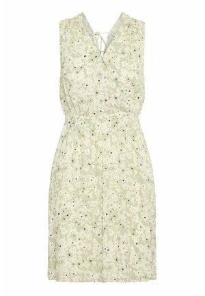 Floral print dress in light green, featuring a V-neck, sleeveless design, elasticated waist, and two side pockets.
