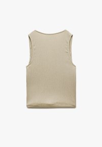 Beige ilmanhihaista toppia teksturoitua kangasta, jossa on pyöreä kaula-aukko. Takana on sileä, puhdas muotoilu ilman lisäkoristuksia.