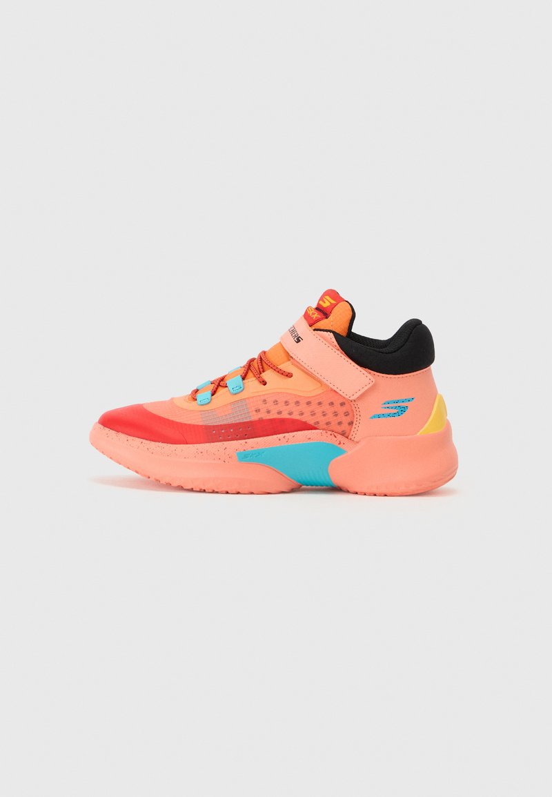 Basketball sneakers featuring a pink upper with red and blue accents, a textured black collar, and a Velcro strap for secure fit.