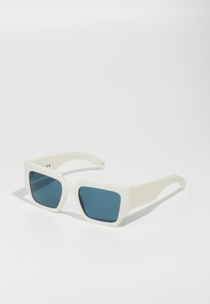 White plastic sunglasses with square frames and tinted blue lenses. Features embossed brand name on the side. Smooth texture, modern design.