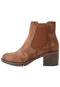 Brown suede ankle boot with elastic side panels, round toe, and a stacked heel. Textured surface with a smooth finish and lightweight sole.