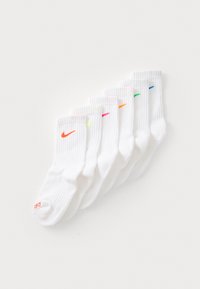 Chaussettes en coton blanc, pack de six, design côtelé, arborant de petits logos Nike colorés dans des teintes néon : orange, rose, vert, bleu et jaune.