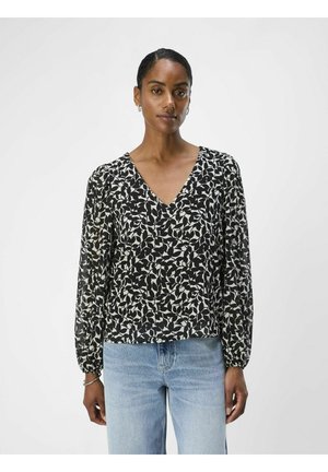 Blusa nera con motivo di foglie bianche, scollatura a V e maniche lunghe con polsini elastici; tessuto leggero e fluido; vestibilità comoda.