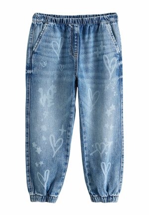 Pantalon jogger en denim bleu clair avec taille et poignets élastiques, décoré de motifs blancs en forme de cœur et d'étoile sur les jambes.