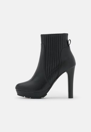 Bottines à talons hauts - black