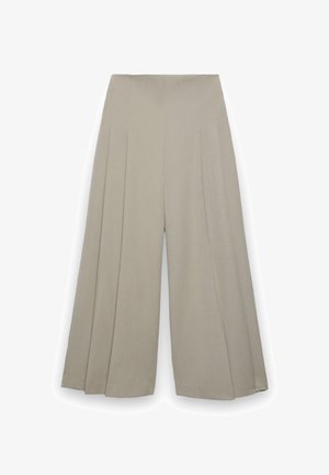 Beige wide-leg pants with a high waist and vertical pleats for added texture and flow.