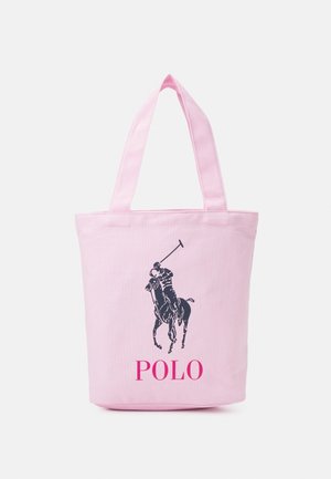Sac en toile rose avec deux poignées, présentant un graphique de joueur de polo marine et le texte "POLO" en rose en bas.