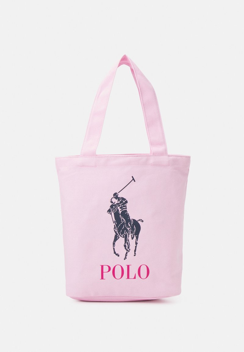 Bolsa de lona rosa con dos asas, que presenta un gráfico de un jugador de polo en azul marino y el texto "POLO" en rosa en la parte inferior.