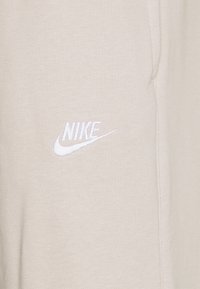 Nike Sportswear Träningsbyxor - off-white