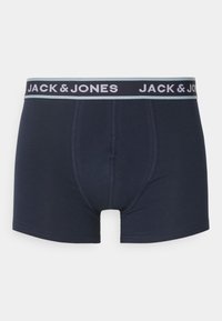 Marineblaue Boxershorts mit einer weichen Textur, ausgestattet mit einem kontrastierenden elastischen Bund in Schwarz und Weiß mit "JACK & JONES" Branding.