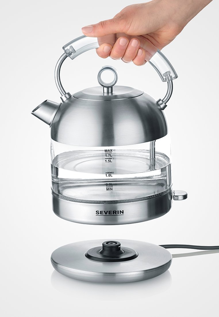 Edelstahl-Wasserkocher mit transparentem Glasgehäuse, oberem Griff, Ausguss und Wasserstandsanzeigen; umfasst eine Basis mit einem Stromkabel.