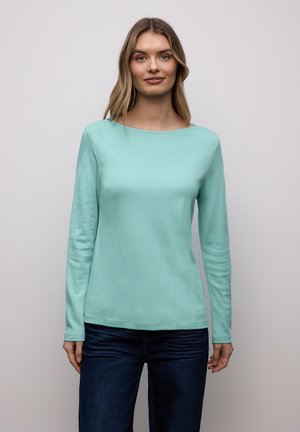 - Bluzka z długim rękawem