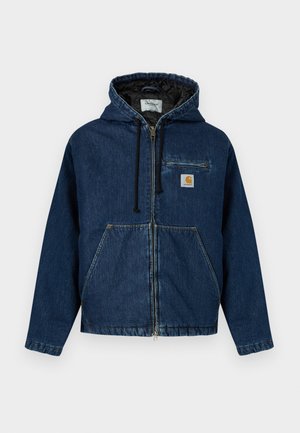 Jeans jakna s kapuco v temno modri barvi z zadrgo, sprednjimi žepi in majhnim žepom na prsih. Ima črto podlogo in nastavljive vrvice.