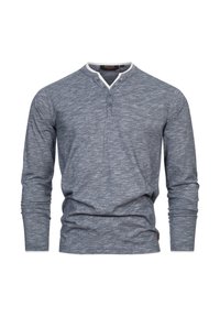 Long-sleeve henley shirt made of textured gray fabric, featuring a white collar, button placket, and fitted sleeves.
