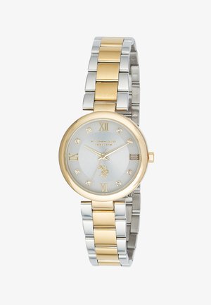 Orologio da polso rotondo bicolore argento e oro con numeri romani, indici in cristallo e logo centrale su quadrante bianco con cinturino in metallo abbinato.