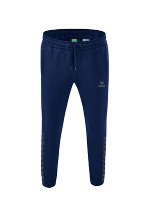 TEAM ESSENTIAL  - Tracksuit bottoms - blau
