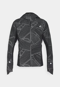 Černá sportovní bunda s reflexním geometrickým vzorem, elegantní design, kompletní zip vpředu a kapuce. Obsahuje kapsy a akcenty na manžetách.