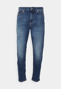 Modré džíny z denimu se rovným střihem, designem s pěti kapsami, mírným vyšisováním na stehnech a zapínáním na knoflík vpředu.