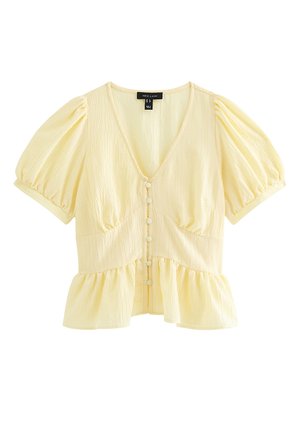 Blusa amarilla pálida de manga corta con mangas abullonadas, escote en V, botones delanteros, bajo peplum recogido y tela texturizada.